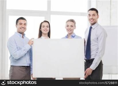 business and office concept - happy business team in office with white blank board