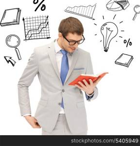 business and office concept - happy man with book
