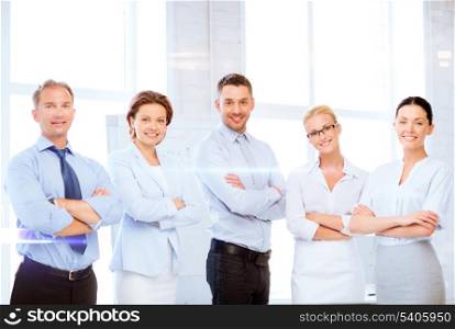 business and office concept - picture of friendly business team in office