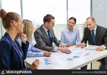 business and office concept - smiling business team at meeting