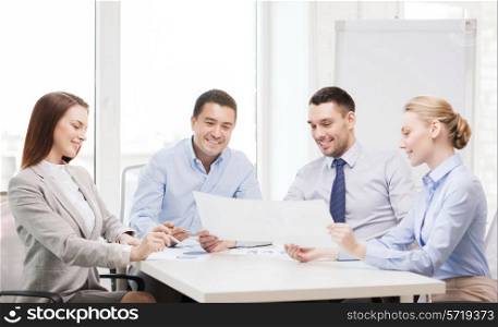 business and office concept - smiling business team having discussion in office