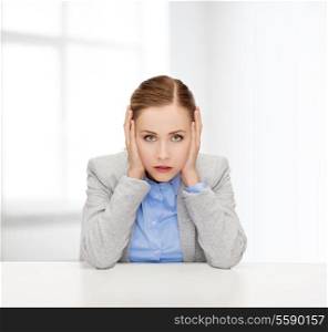 business and office concept - stressed businesswoman covering her ears with hands
