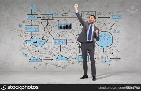 business and office concept - young happy businessman with hands up celebrating victory