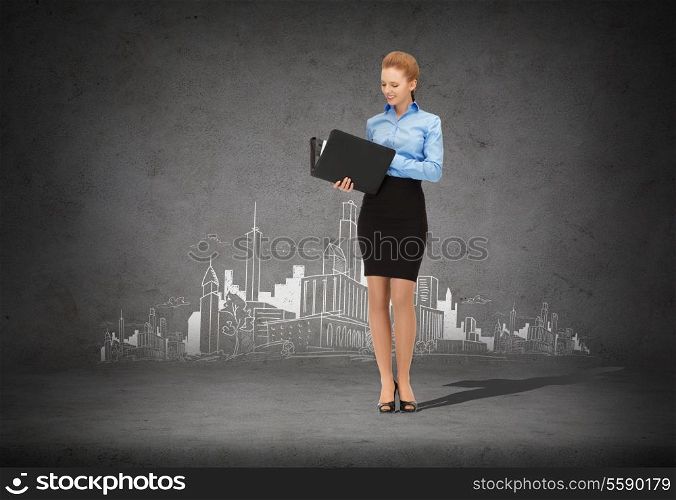 business and office concept - young smiling businesswoman with folder and city drawing in the back