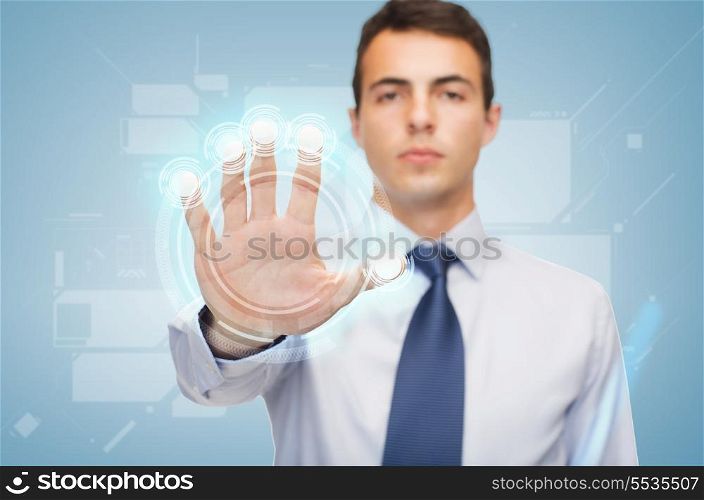 business and office, future technology concept - attractive buisnessman working with virtual screen
