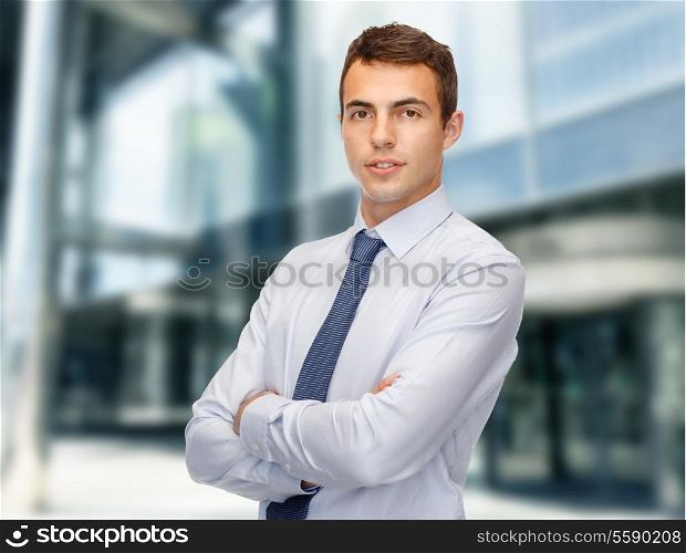 business and office, people concept - friendly young businessman