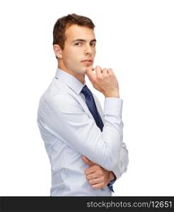 business and office, people concept - pensive young buisnessman