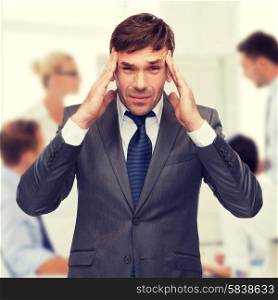 business and office, stress, problem, crisis concept - stressed buisnessman or teacher having headache