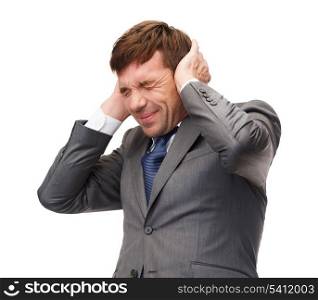 business and office, stress, problem, crisis, loud noise concept - stressed buisnessman or teacher closing ears