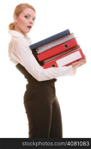 Business and paperwork. Tired overworked busy businesswoman carrying stack of folders with files documents isolated on white.