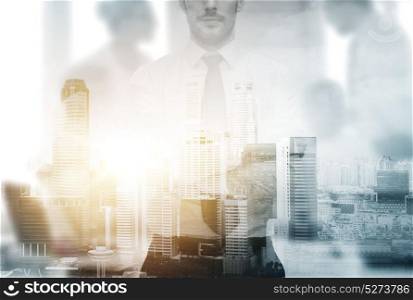 business and people concept - close up of businessman over city background and double exposure effect. close up of businessman over city background