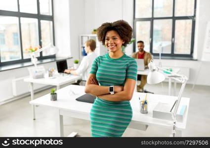 business and people concept - happy smiling african american woman at office. happy smiling african american woman at office