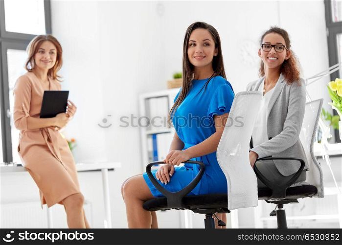business and people concept - smiling woman at meeting in office. smiling woman at business meeting in office. smiling woman at business meeting in office