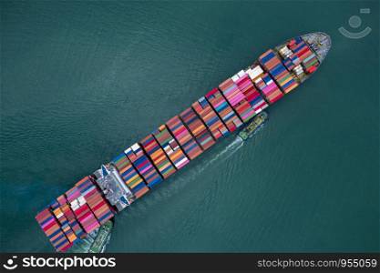 business and shipping cargo containers by special large shipping vessels service industry transportation import and export international products open sea aerial angle view from drone