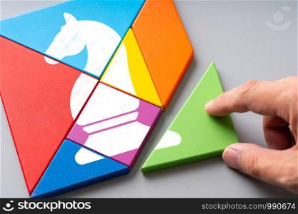 Business and strategy icon on colorful puzzle