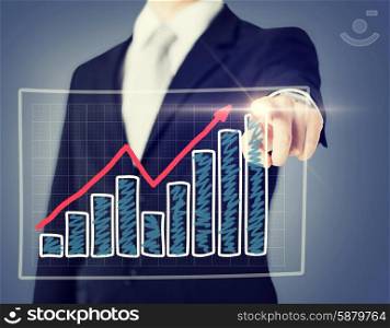 business and technology concept - businessman hand with chart on virtual screen