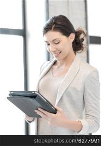 business and technology concept - happy woman with tablet pc computer