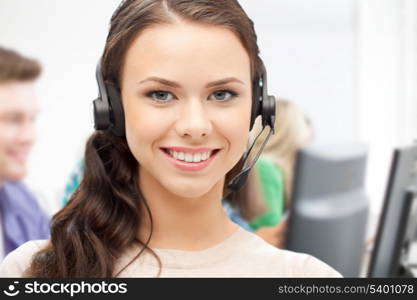 business and technology concept - helpline operator with headphones in call centre