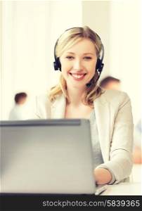 business and technology concept - helpline operator with headphones in call centre. helpline operator with headphones in call centre