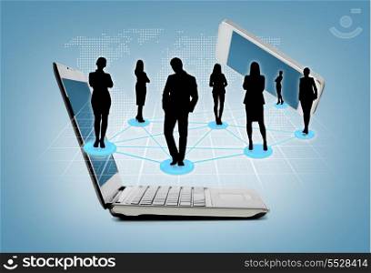 business and technology concept - smartphone and laptop with social or business network
