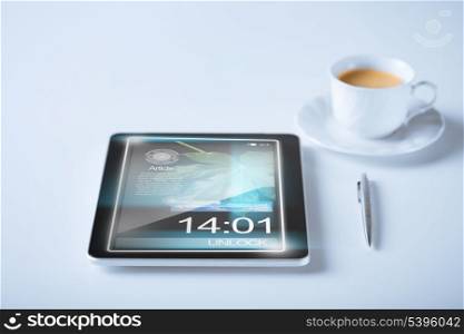 business and technology concept - tablet pc and cup of coffee