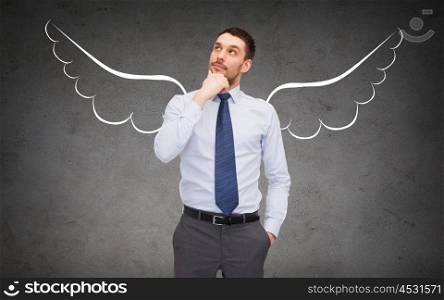 business, angel investor, safety, security and people concept - young businessman with wings drawing over gray concrete background