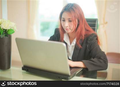 business asian young woman with laptop