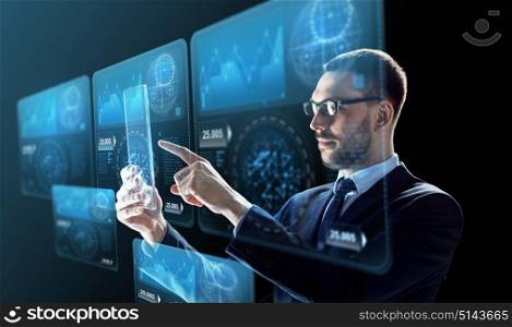 business, augmented reality and future technology concept - businessman in glasses working with transparent tablet pc computer and virtual screens projections over black background. businessman with tablet pc and virtual screens