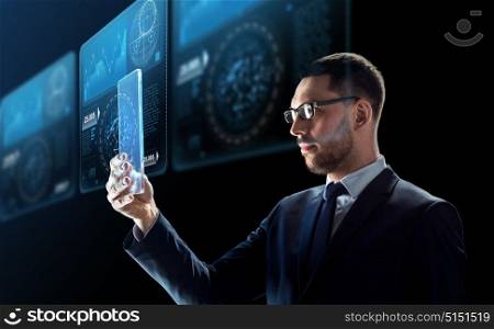 business, augmented reality and future technology concept - businessman in glasses working with transparent tablet pc computer and virtual screens projections over black background. businessman with tablet pc and virtual screens