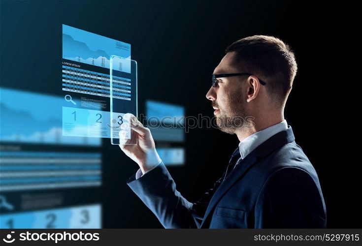 business, augmented reality and future technology concept - businessman in glasses working with transparent tablet pc computer and virtual exchange charts projections over black background. businessman with tablet pc and exchange charts