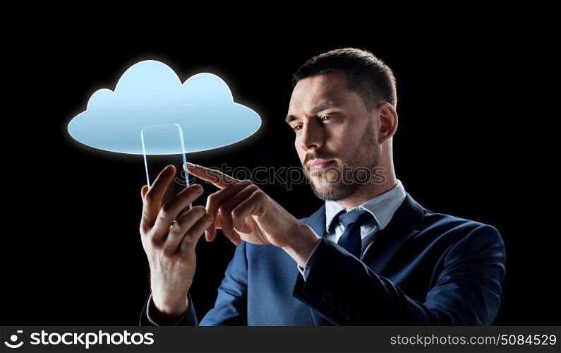 business, augmented reality and future technology concept - businessman in suit working with transparent smartphone and cloud computing hologram over black background. businessman with transparent smartphone. businessman with transparent smartphone