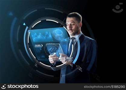 business, augmented reality and future technology concept - businessman in suit working with transparent tablet pc computer and virtual screens projections over black background. businessman with tablet pc and virtual projection