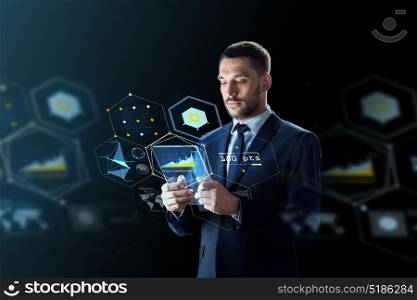 business, augmented reality and future technology concept - businessman in suit working with transparent tablet pc computer and virtual screens projections over black background. businessman with tablet pc and virtual projections