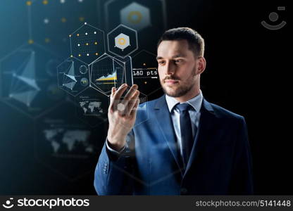 business, augmented reality and future technology concept - businessman working with transparent smartphone and virtual screens projections over black background. businessman with smartphone and virtual holograms