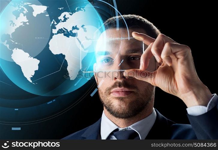business, augmented reality and modern technology concept - businessman working with transparent smartphone and virtual earth globe hologram over black background. businessman with smartphone and virtual globe. businessman with smartphone and virtual globe