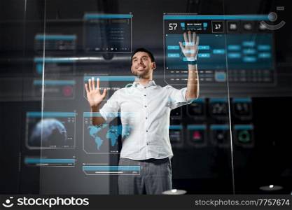 business, augmented reality and technology concept - happy smiling businessman working and touching glass screen with virtual projection at night office. businessman with virtual projections on screen