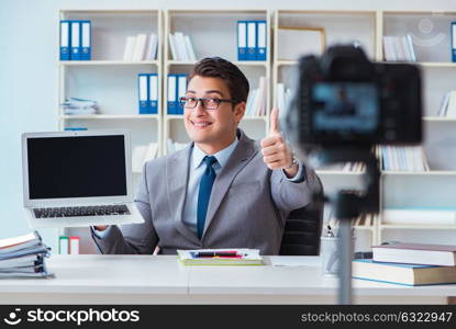 Business blogger doing webcast for his subscribers