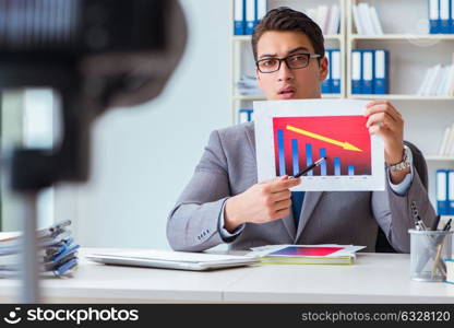 Business blogger doing webcast for his subscribers