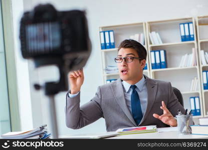 Business blogger doing webcast for his subscribers