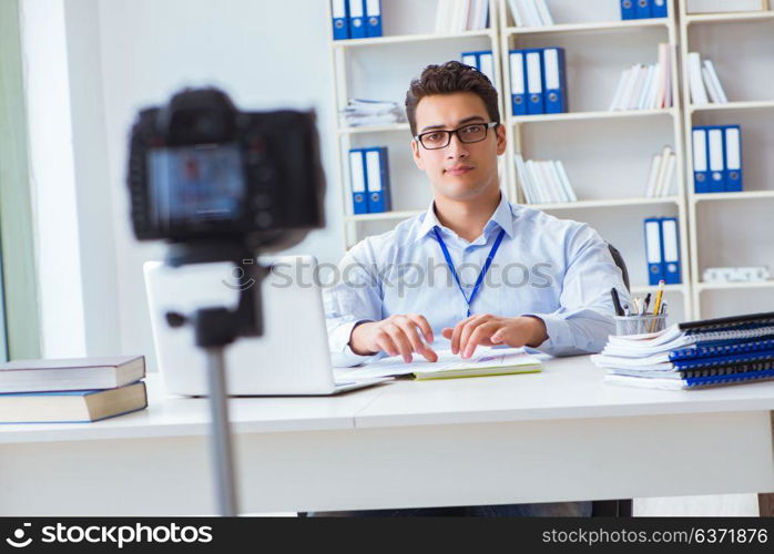 Business blogger doing webcast for his subscribers