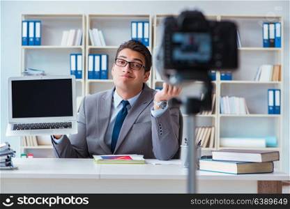Business blogger doing webcast for his subscribers