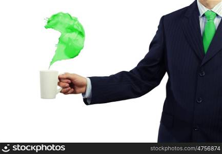 Business break. Businessman holding white cup with question mark in hand