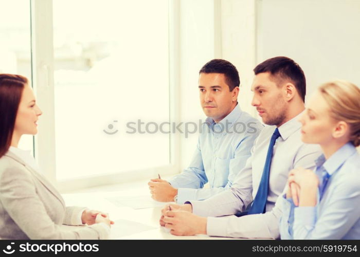 business, career and office concept - businesswoman at job interview in office