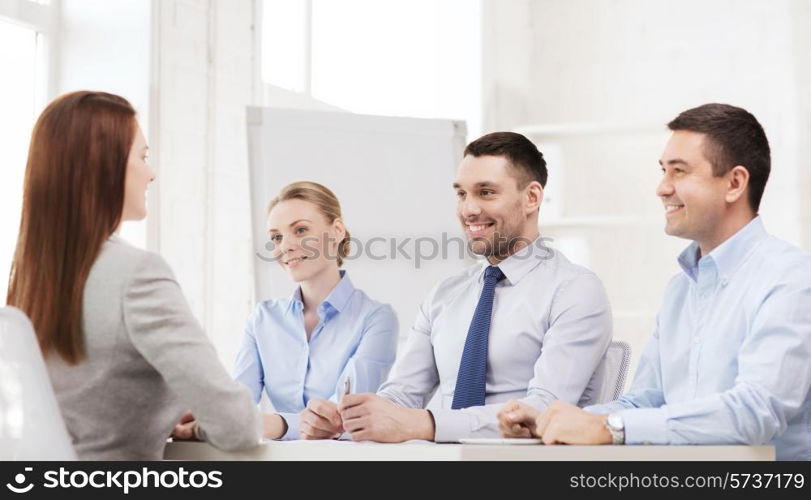 business, career and office concept - smiling businesswoman at job interview in office