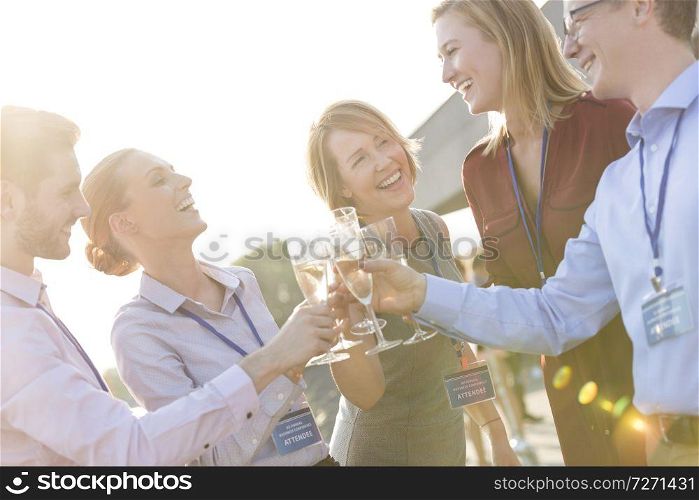 Business colleagues applauding during rooftop success party