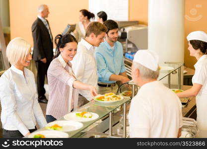 Business colleagues in cafeteria cook serve fresh healthy food meals