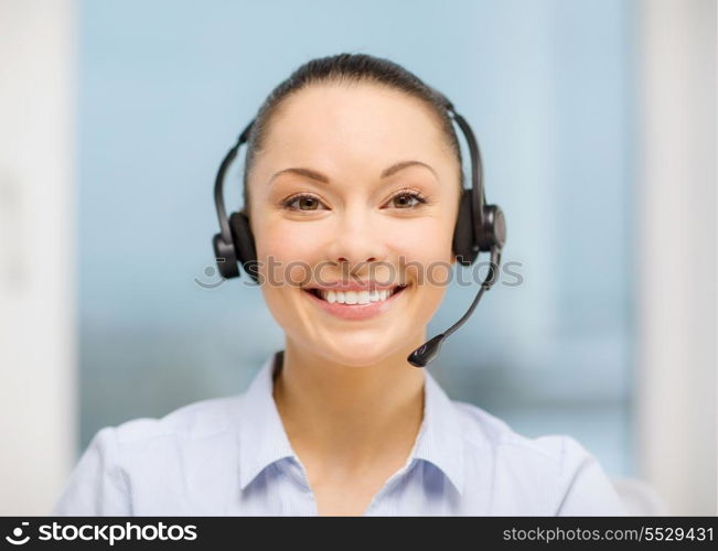 business, communication and call center concept - female helpline operator with headphones