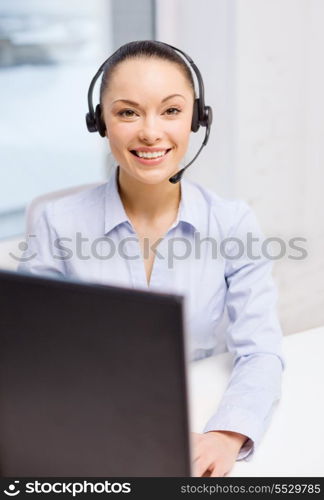 business, communication and call center concept - friendly female helpline operator with headphones