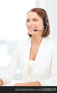 business, communication and call center concept - smiling female helpline operator with headphones in call center