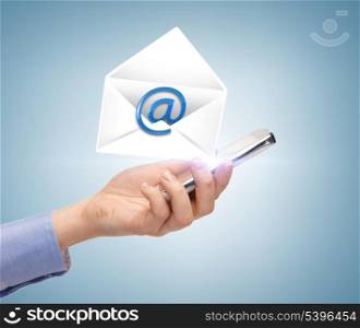 business, communication and future technology - woman holding smartphone with email icon